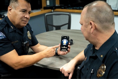 Chief Jeffrey Martinez of the Sheridan (CO) Police Department demonstrates one of the department’s apps. The department uses two new customized apps, one for crime and accident victim support and one to help officers in crisis.