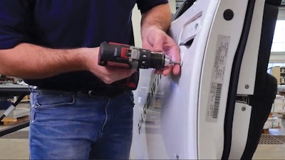 A ballistic door panel is attached easily to the exterior of a door.