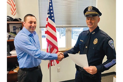 Sanford, ME, Police Chief Craig Andersen swears in a new officer. Andersen is an advocate of decentralized command that he says empowers his troops. (Photo: Sanford PD)