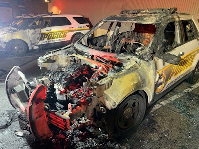 Three police cars were destroyed by fire overnight while parked outside a training facility in Pittsburgh, PA. Officials have categorized the fires as suspicious.