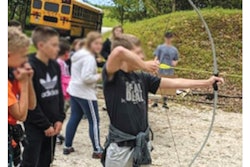 Kids taking archery lessons at Camp Character, the day camp developed through Willard PD’s PAL program. (Photo: Willard PD)