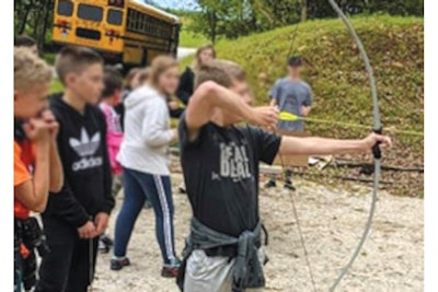 Kids taking archery lessons at Camp Character, the day camp developed through Willard PD’s PAL program. (Photo: Willard PD)