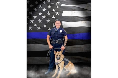 Fallen Richmond, IN, police officer Seara Burton with K-9 partner Brev. The dog has been retired. (Photo: Richmond PD)