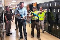 Oklahoma Gov. Kevin Hitt joins state troopers during active shooter response training that was mandated by his executive order in June. All troopers will complete the course by the end of the year.