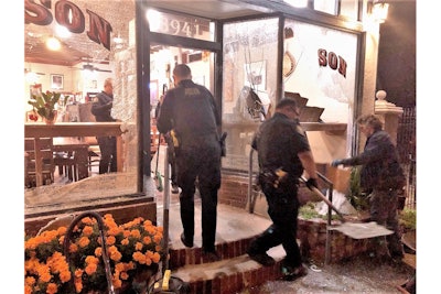 Portland officers work outside the Bison coffee shop. The business was attacked for hosting Coffee with a Cop. (Photo: Mayor Ted Wheeler/Twitter)