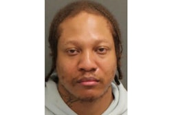 A federal officer recognized the 'H' tattoo on Quashon Burton's neck while the fugitive was visiting Disney World. Burton was arrested for allegedly stealing COVID relief money. (Photo: Orange County SO)