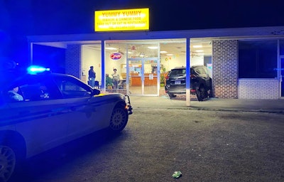 Two South Carolina police officers sustained minor injuries Monday when an SUV crashed into the restaurant where they were having dinner.