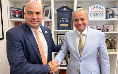 Randy Acosta, chief development officer of First Responders Children’s Foundation is shown with Henry Repeating Arms CEO & founder Anthony Imperato, right.