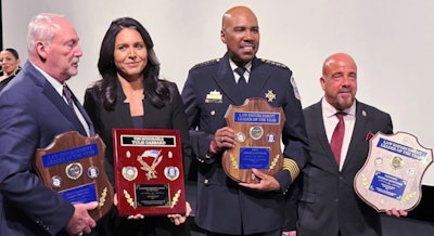 Award recipients are, from left, Harry Phillips, Police Unity Tour executive director; former Congresswoman Tulsi Gabbard; Chief Robert Contee III, of the DC Metro Police Department; and Pat Montuore, Police Unity Tour president.