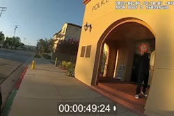 Still from body-worn camera video shows gunman shooting at Officer Milward. A second officer returned fire and killed the suspect. (Photo: Orange County DA)