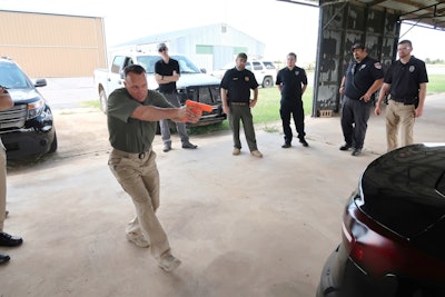 Mike Willis, of the United States Deputy Sheriff's Association, conducts a training on felony and high-risk traffic stops.