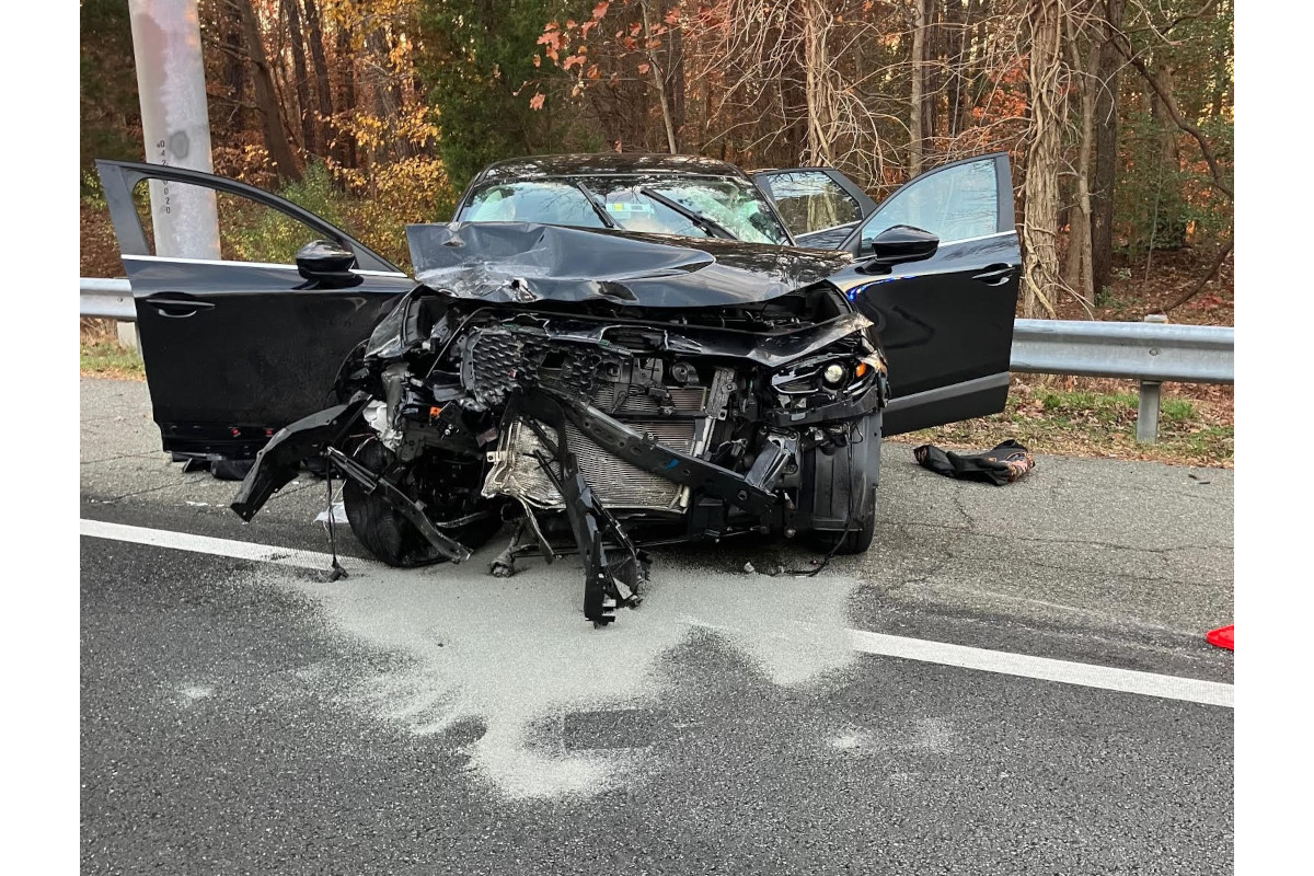 The remains of a Mazda SUV that crashed after the driver reportedly dragged a Virginia trooper three miles. (Photo: VSP)