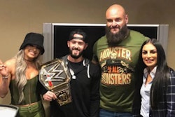 Bristol police officer Alex Iurato holds a WWE belt while posing with Liv Morgan, left, Braun Strowman and Sonya Deville. (Photo: Bristol Police Department)