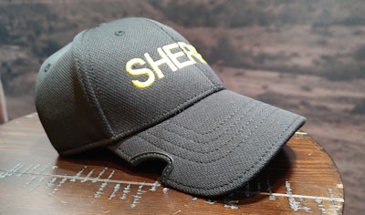 Notch makes caps with notches cut into each side the bill to allow space for the frame of sunglasses.