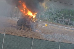 Construction equipment burns after an attack at the Atlanta Public Safety Training Facility Sunday.