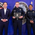 Officer Nickolas Wilt (center) just graduated from the police academy March 31. He was shot in the head responding to the attack and is in critical condition.