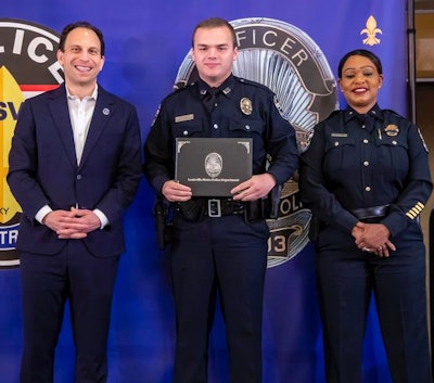 Officer Nickolas Wilt (center) just graduated from the police academy March 31. He was shot in the head responding to the attack and is in critical condition.