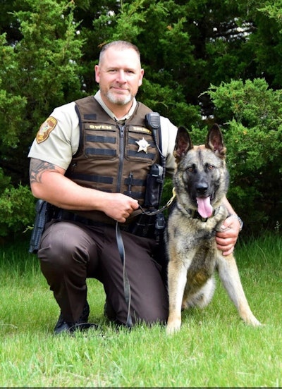 Deputy Joshua Owen served with the Pope County (MN) Sheriff's Office for 12 year. He's shown here with his K-9 partner Karma.