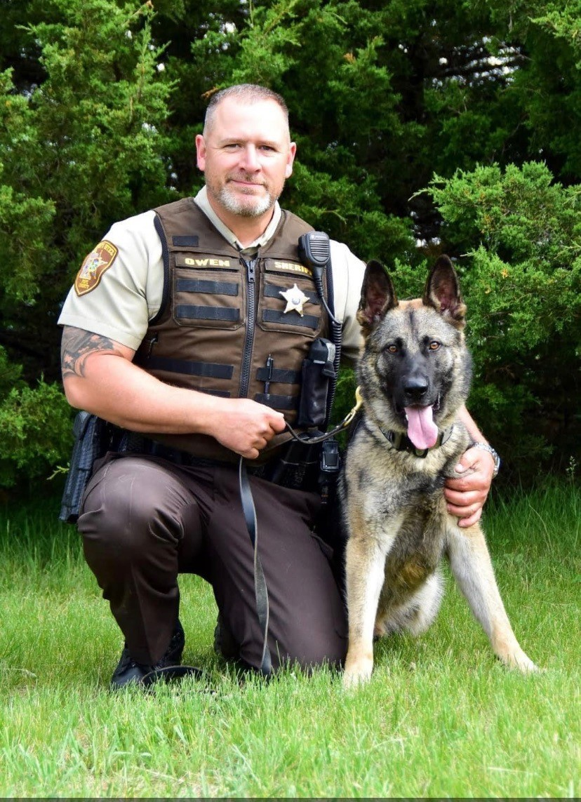 Deputy Joshua Owen served with the Pope County (MN) Sheriff's Office for 12 year. He's shown here with his K-9 partner Karma.