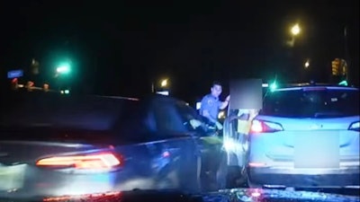 Dashcam video captures the moment when Patrolman Connor Boyle was struck by a car while he was assisting a disabled motorist.