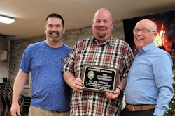 Joseph Johnson, center, receives the Outstanding Performance Award from the Nyssa Police Department, where he was a reserve officer. It was presented by Chief Don Ballou and City Manager Jim Maret.