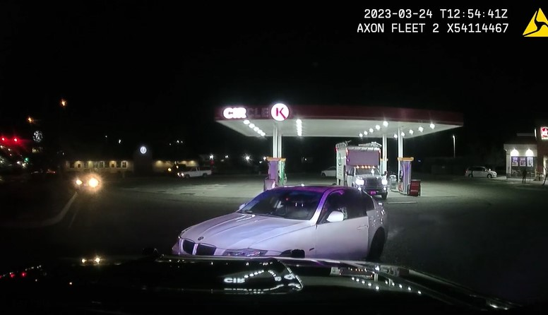 Pasco Police Officer Phil Hanks approaches a suspect vehicle on March 24 and the suspect opens fire. Hanks was hit then treated and released at a local hospital.