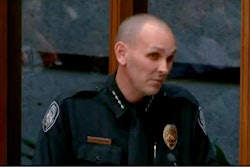 Chief John Thompson pitches the plan to the city council during a meeting.