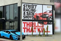The California Highway Patrol is hoping to discourage street racing and sideshows with outdoor advertising like this wrecked super car installation in Los Angeles.