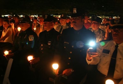 Officers and police supporters honoring the fallen during National Police Week.