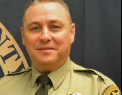 Lt. Scott Underwood died Friday after his mower overturned pinning him in a creek.