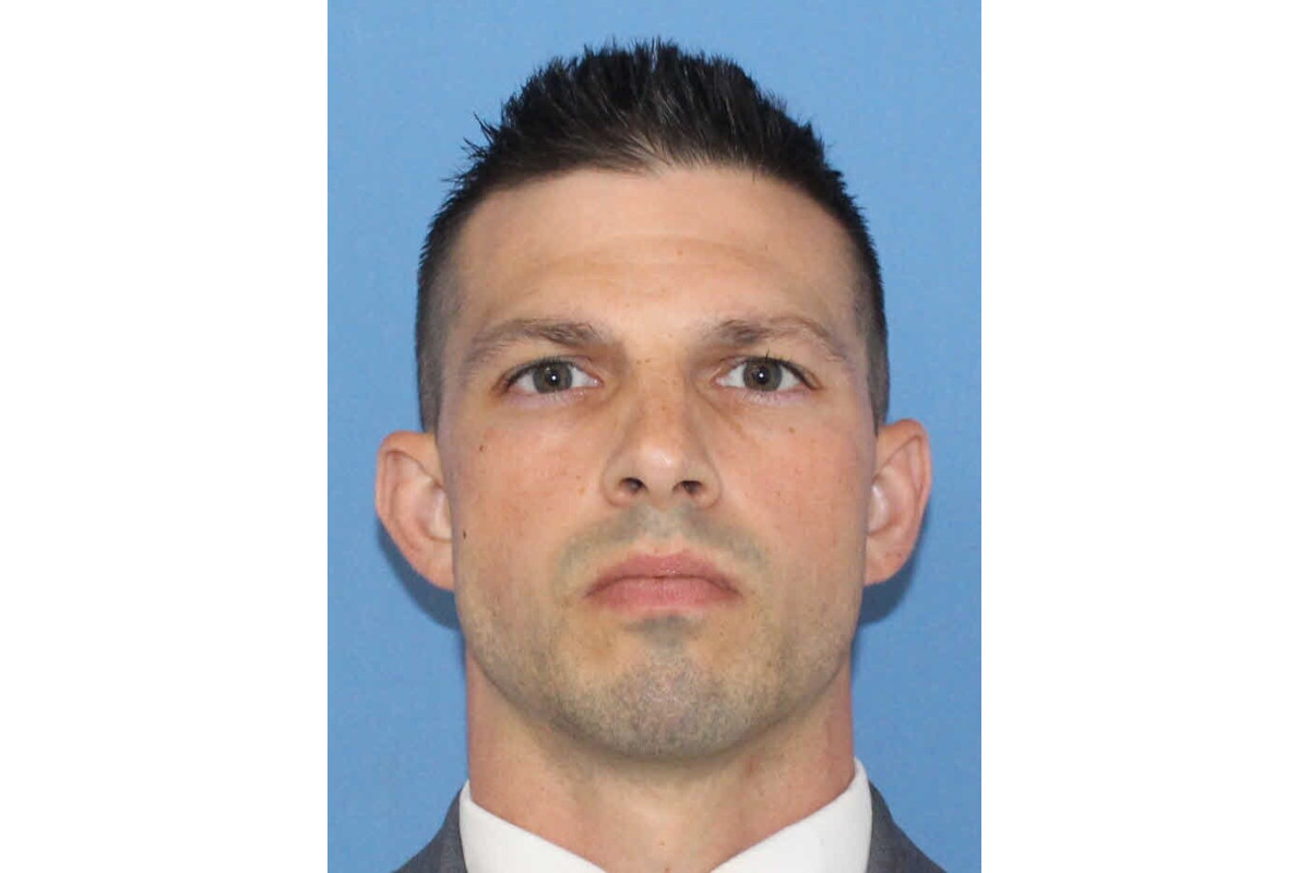 Officer David Piatek of the Town of Tonawanda Police Department was dragged by a stolen car and badly injured.