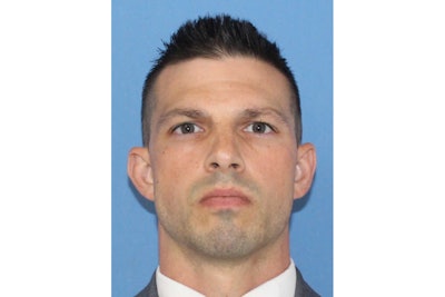 Officer David Piatek of the Town of Tonawanda Police Department was dragged by a stolen car and badly injured.