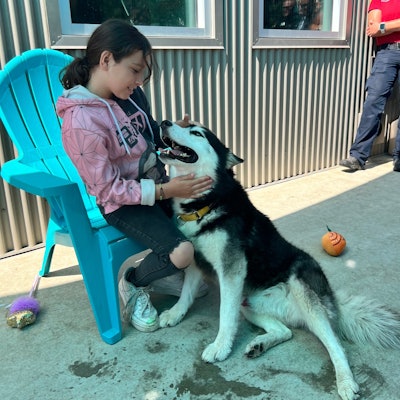 Eight-year-old Priscilla Aguilar and her new friend Atlas.