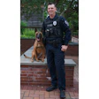 Cary, NC, Police K-9 Handler Officer Michael Herrell and his partner Dakota. The 3-year-old Belgian Malinois was hospitalized Friday after being injured by a suspect driving away in a stolen truck.