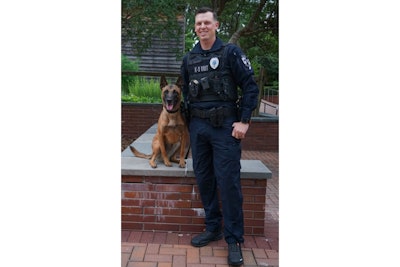 Cary, NC, Police K-9 Handler Officer Michael Herrell and his partner Dakota. The 3-year-old Belgian Malinois was hospitalized Friday after being injured by a suspect driving away in a stolen truck.
