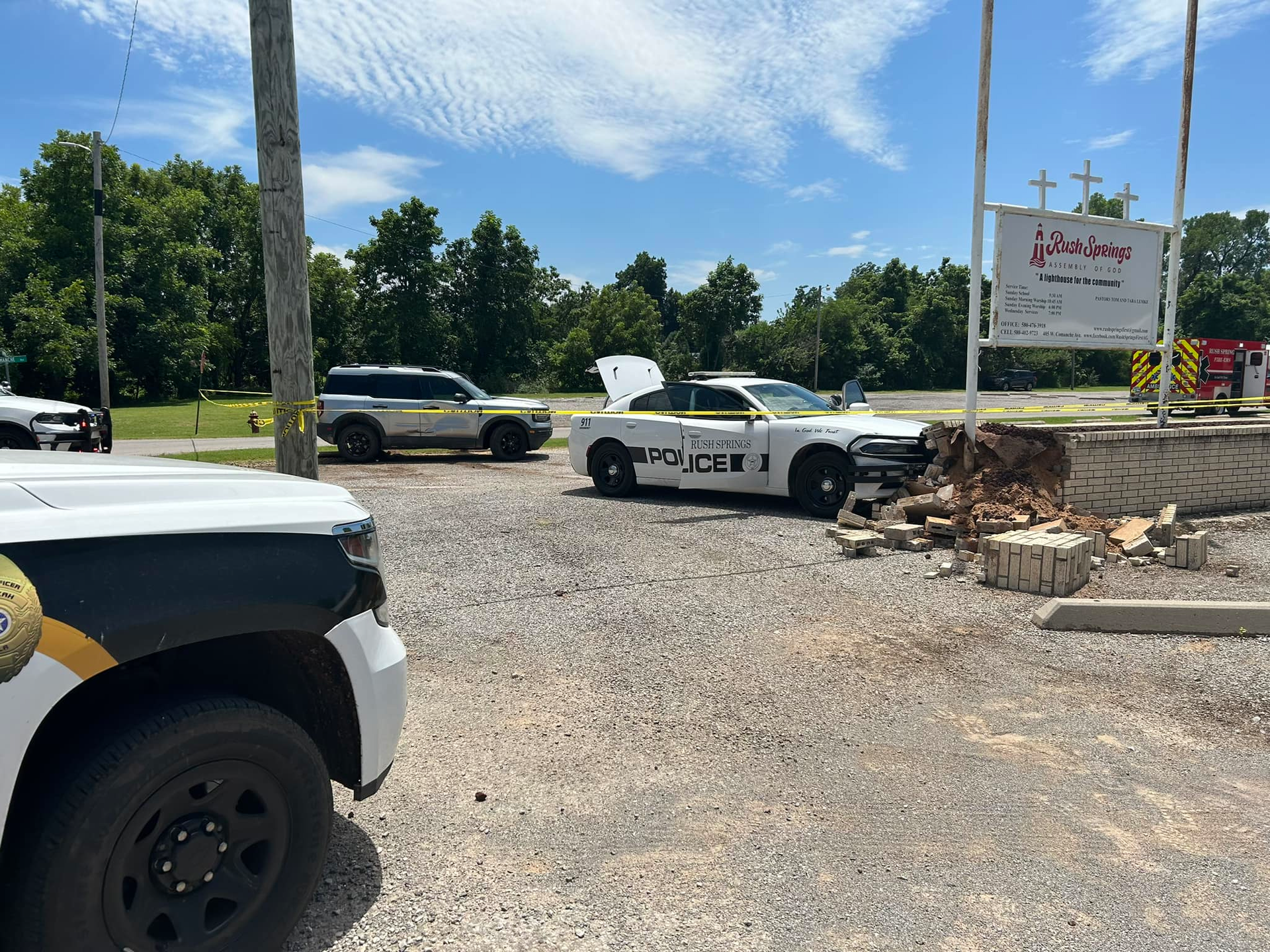 A detainee tried to drive away in an Oklahoma officer's patrol vehicle and ran over an officer before crashing.