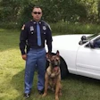 Gary Police Cpl. Angel Lozano with his K-9 partner Falco who was shot and killed last week after serving eight years.