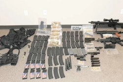 Investigators found an arsenal inside the cop killer's car.