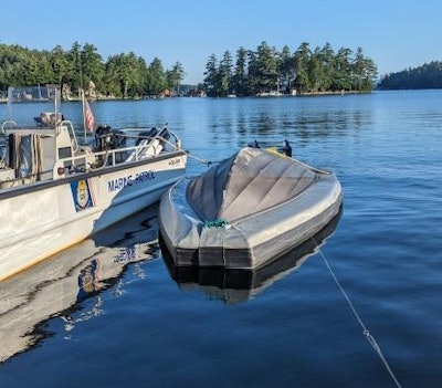 New Hampshire State Police recovering a patrol boat that capsized after an accident Wednesday night.