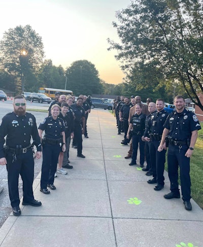 Officers from the Louisville Metro Police lined up to welcome a fallen officer's son to his first day of kindergarten Tuesday.