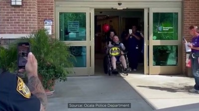 Sgt. Ron Malone of the Ocala (FL) Police Department, known as 'Batman' to his fellow officers, leaves the hospital after 17 days. Malone's patrol vehicle was intentionally struck head-on by a hit-and-run suspect on the night of Aug. 26.