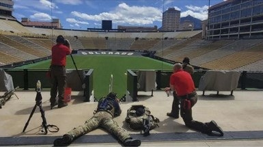 SWAT snipers participate in live-fire training at Folsom Field, the University of Colorado Boulder's football stadium.