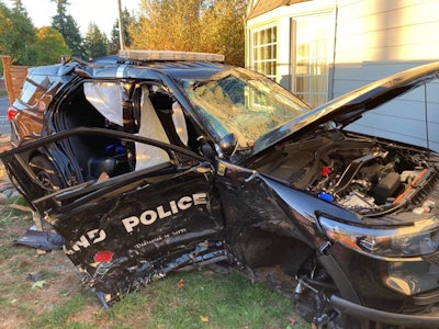 The police SUV sustained a serious side impact, injuring two officers.
