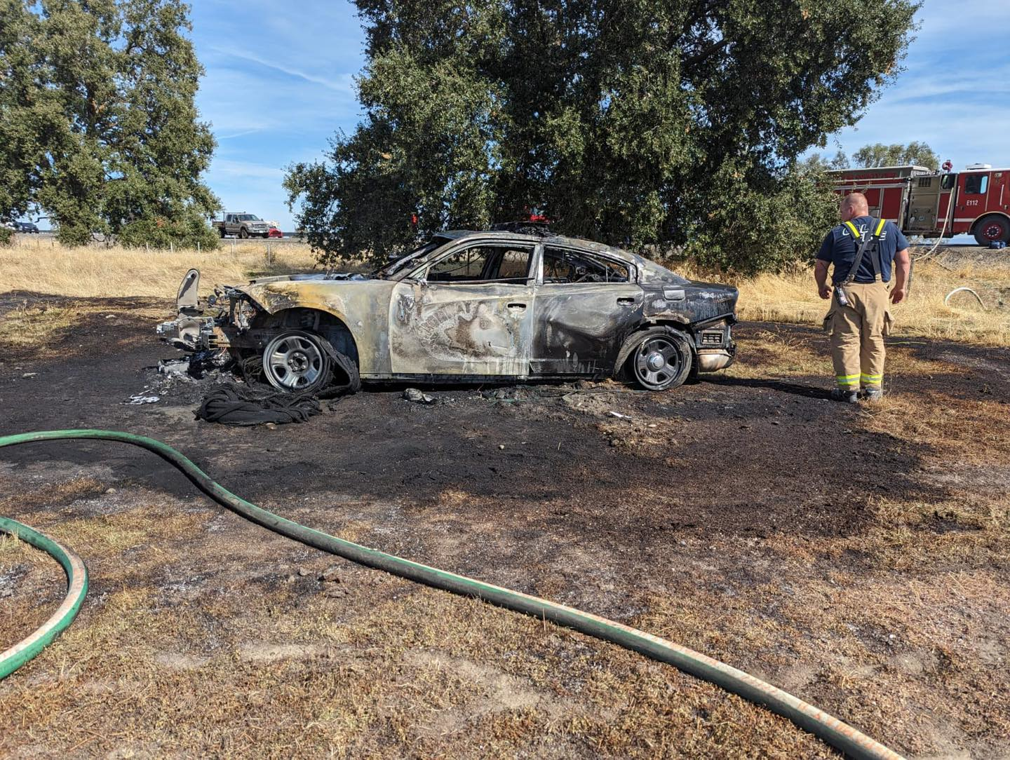 The stolen CHP patrol vehicle crashed into a truck and burned.