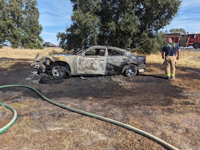 The stolen CHP patrol vehicle crashed into a truck and burned.