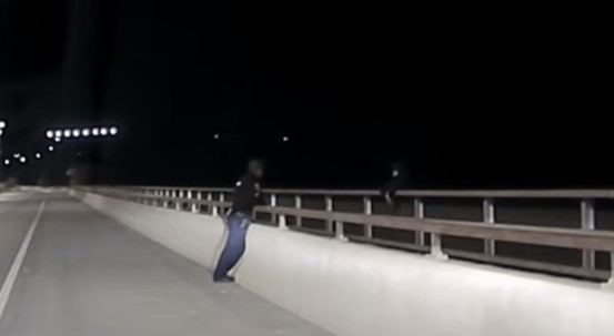 Great Falls (Montana) Master Police Officer Jacob Smith talks to a suicidal subject. Officer Smith was able to talk the teen male out of jumping.