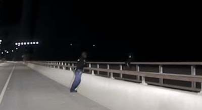 Great Falls (Montana) Master Police Officer Jacob Smith talks to a suicidal subject. Officer Smith was able to talk the teen male out of jumping.