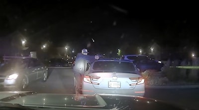 Sill image from in-vehicle video shows Cristobal Santana opening fire on Illinois State Police Trooper Dakotah Chapman-Green, police say.