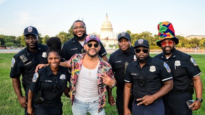Country music artist and former police officer Frank Ray with officers in Washington, DC.
