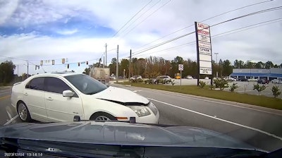 Glynn County (Georgia) Sheriff's Deputy Christopher Hatcher put his patrol vehicle between a crashing stolen vehicle and oncoming traffic.